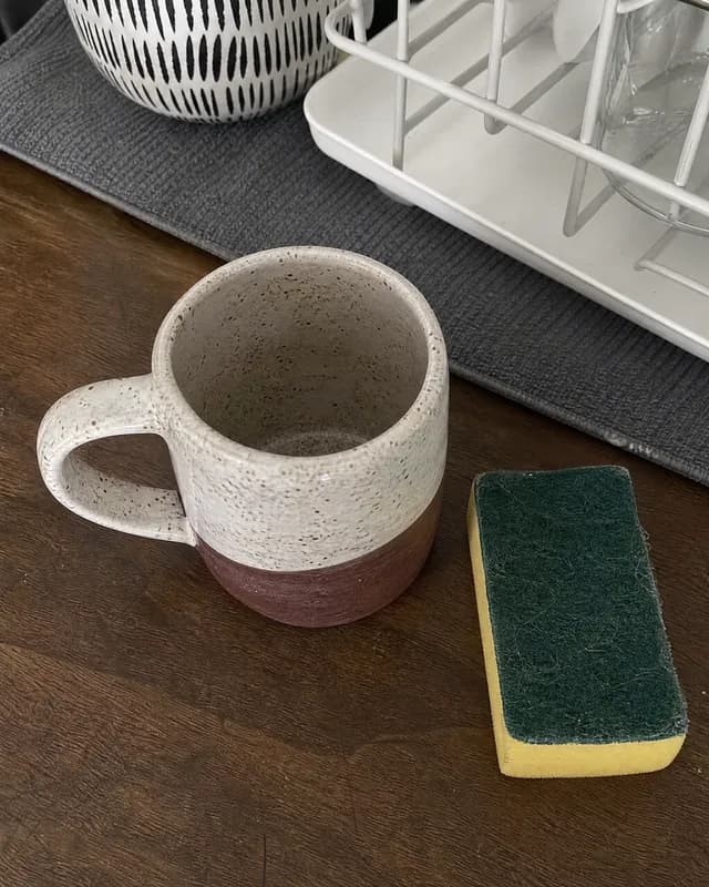 An example phone photo of a speckled ceramic mug