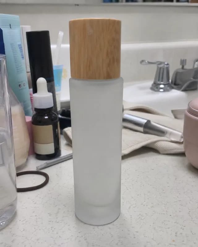 An example phone photo of a frosted-glass skincare bottle